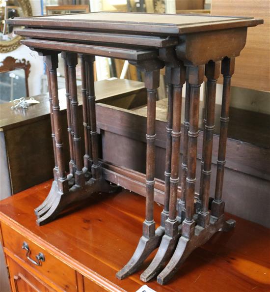 Nest of three Edwardian mahogany tables(-)